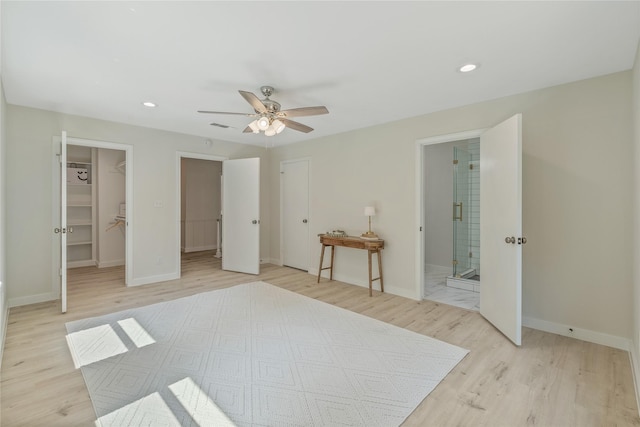 bedroom featuring baseboards and light wood-type flooring