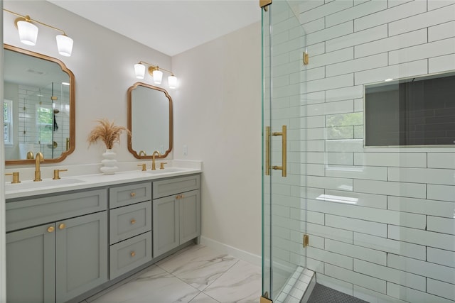 full bathroom featuring a sink, marble finish floor, and a stall shower