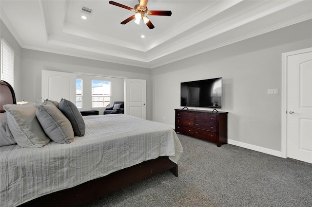 14315 Pecos Ln, Baytown, TX 77523 - bedroom featuring a tray ceiling, carpet floors, recessed lighting, baseboards, and crown molding