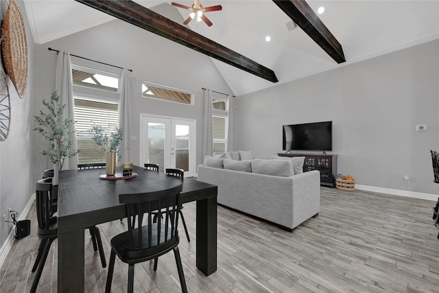 14315 Pecos Ln, Baytown, TX 77523 - living room with beamed ceiling, baseboards, french doors, light wood-style floors, and a ceiling fan