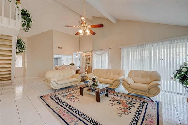 living room featuring high vaulted ceiling, a wealth of natural light, a ceiling fan, and tile patterned flooring