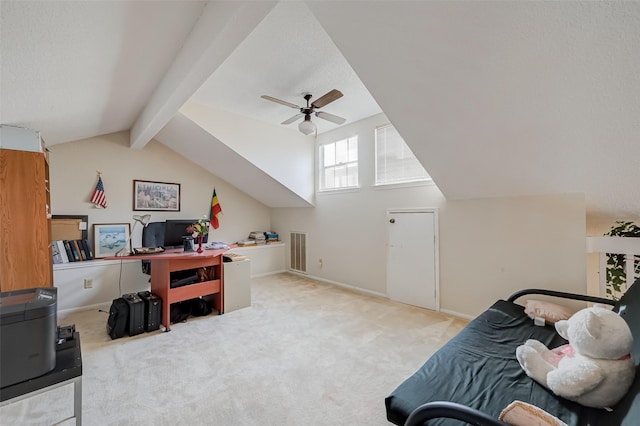 home office featuring vaulted ceiling with beams, visible vents, baseboards, a ceiling fan, and carpet floors