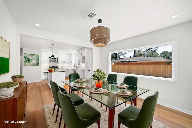 4207 Marlborough Dr, Houston, TX 77092 - dining space with baseboards, recessed lighting, and light wood-type flooring