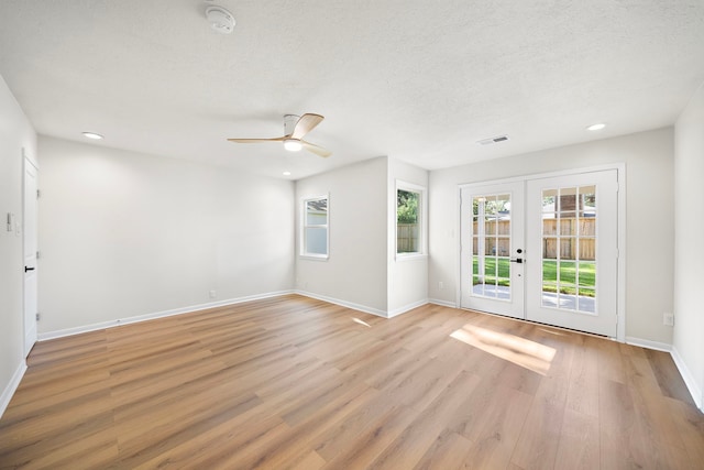 4207 Marlborough Dr, Houston, TX 77092 - empty room featuring french doors, light wood-style floors, ceiling fan, baseboards, and recessed lighting