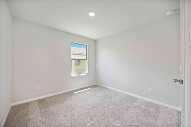 810 Clear Valley Ln, Dayton, TX 77535 - spare room featuring carpet floors and a smoke detector