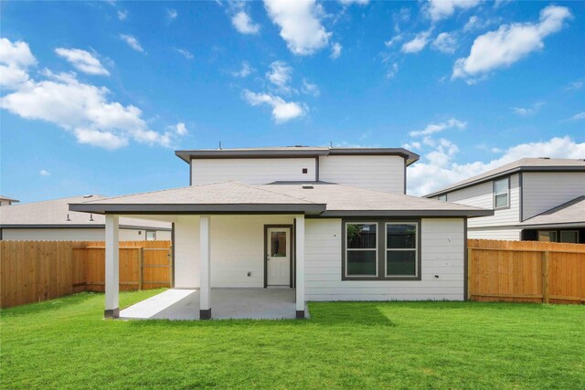 810 Clear Valley Ln, Dayton, TX 77535 - back of property with a patio area and a fenced backyard
