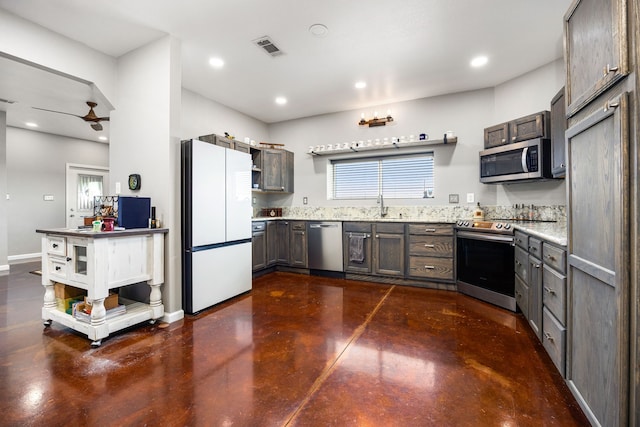 kitchen with visible vents, recessed lighting, a ceiling fan, concrete floors, and appliances with stainless steel finishes