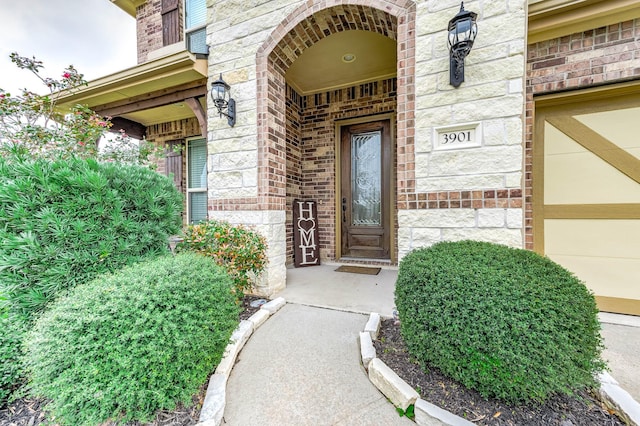 3901 Penny Ln, Deer Park, TX 77536 - doorway to property with brick siding and stone siding