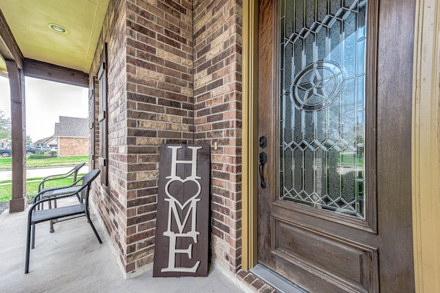 3901 Penny Ln, Deer Park, TX 77536 - property entrance featuring brick siding and covered porch