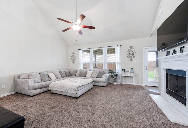 3901 Penny Ln, Deer Park, TX 77536 - living area featuring carpet flooring, high vaulted ceiling, a ceiling fan, a fireplace, and baseboards