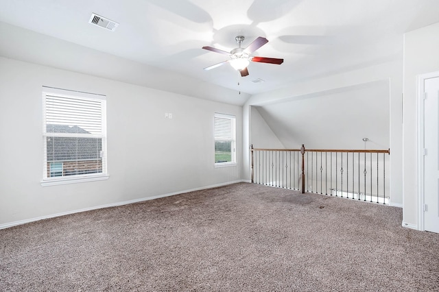 3901 Penny Ln, Deer Park, TX 77536 - bonus room with a ceiling fan, carpet flooring, vaulted ceiling, and baseboards