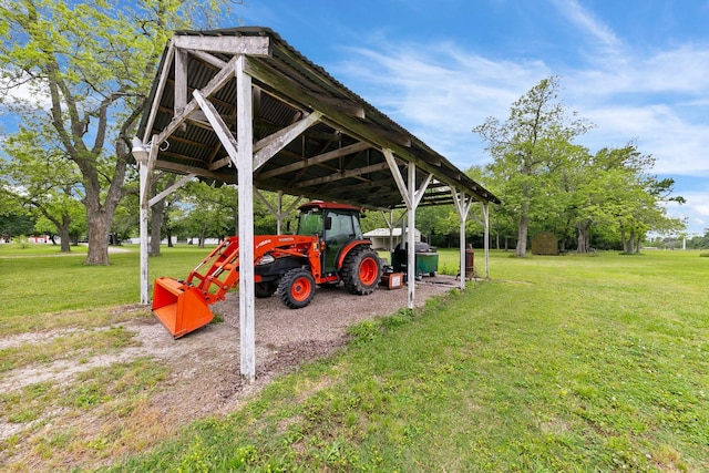 exterior space featuring a lawn and a carport