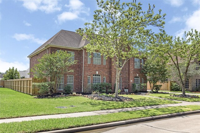 1509 Shamrock Ln, Deer Park, TX 77536 - view of front facade featuring brick siding and a shingled roof