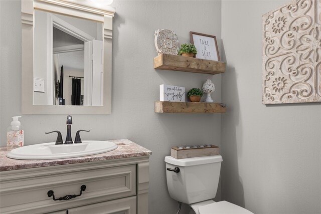 1509 Shamrock Ln, Deer Park, TX 77536 - bathroom featuring toilet and vanity