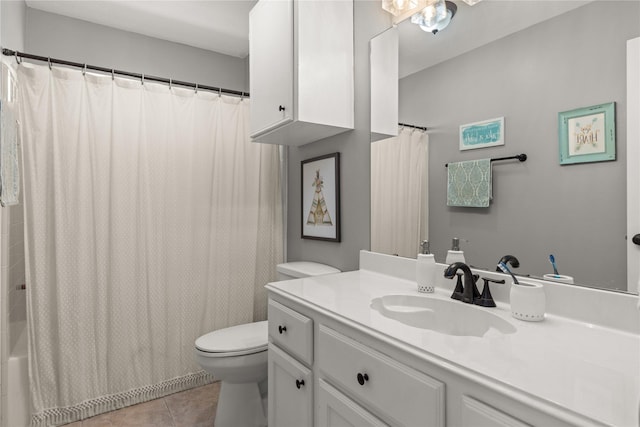 1509 Shamrock Ln, Deer Park, TX 77536 - full bath with toilet, vanity, tile patterned flooring, and shower / bathtub combination with curtain