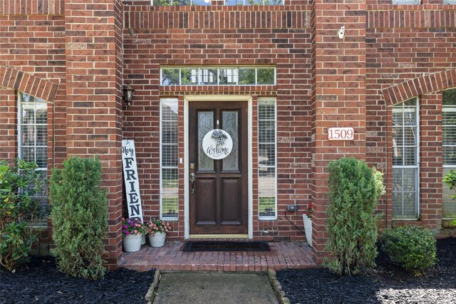 1509 Shamrock Ln, Deer Park, TX 77536 - doorway to property featuring brick siding