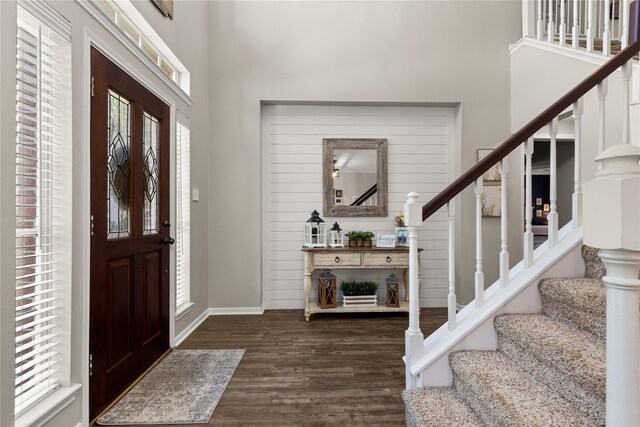 1509 Shamrock Ln, Deer Park, TX 77536 - entryway featuring stairs, dark wood-type flooring, baseboards, and a high ceiling