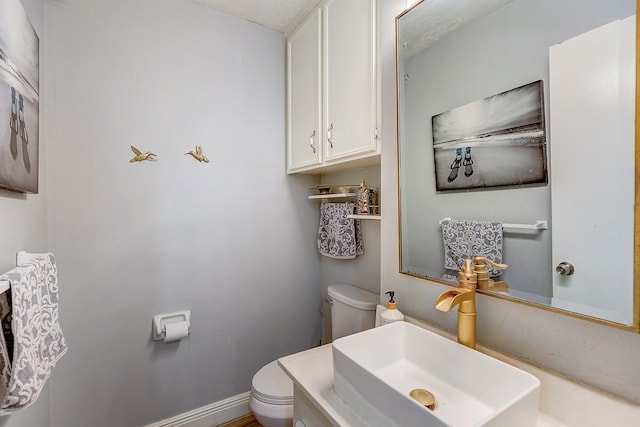 5111 Rockland Dr, Pearland, TX 77584 - bathroom featuring toilet and a sink