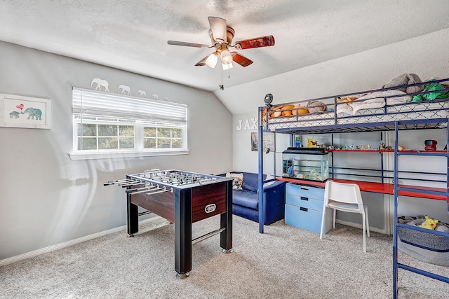 5111 Rockland Dr, Pearland, TX 77584 - bedroom with a textured ceiling, carpet, baseboards, vaulted ceiling, and ceiling fan