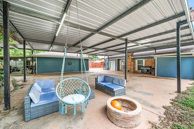 5111 Rockland Dr, Pearland, TX 77584 - view of patio with an outbuilding