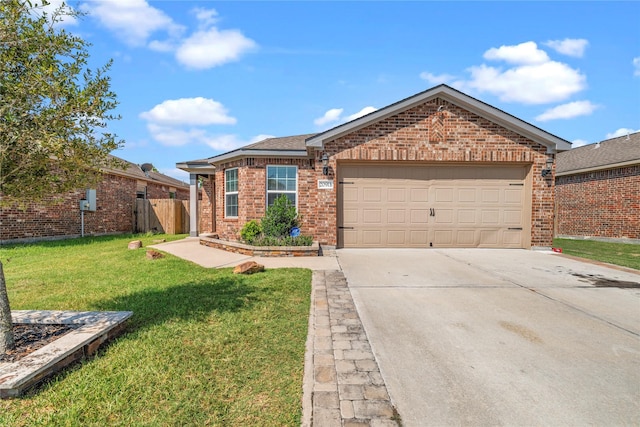 ranch-style house featuring brick siding, an attached garage, a front yard, and concrete driveway