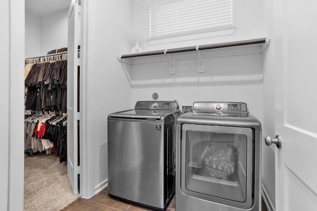 17318 Autumn Sage Ct, Conroe, TX 77385 - washroom with laundry area, washer and clothes dryer, and dark wood-style flooring