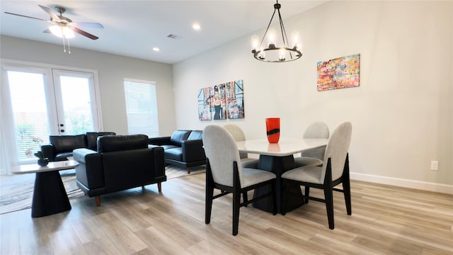1106 Adele St, Houston, TX 77009 - dining area featuring ceiling fan with notable chandelier, light wood-type flooring, visible vents, recessed lighting, and baseboards