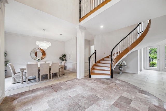 14 Tredington St, Sugar Land, TX 77479 - foyer with stairway, baseboards, a high ceiling, decorative columns, and recessed lighting