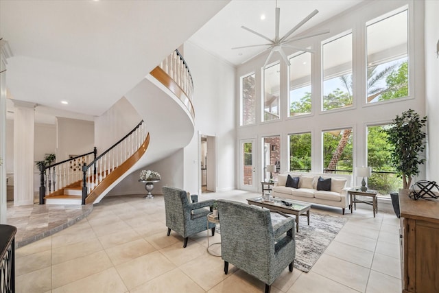 14 Tredington St, Sugar Land, TX 77479 - living area featuring a high ceiling, stairs, light tile patterned floors, ceiling fan, and recessed lighting