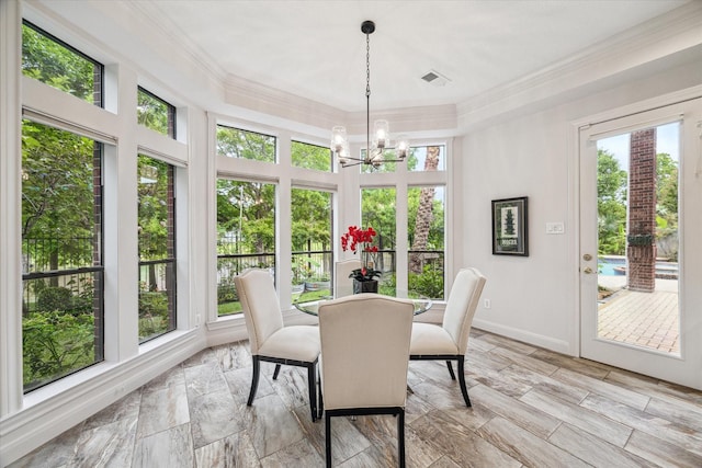 14 Tredington St, Sugar Land, TX 77479 - sunroom featuring ornamental molding, healthy amount of natural light, a chandelier, and baseboards