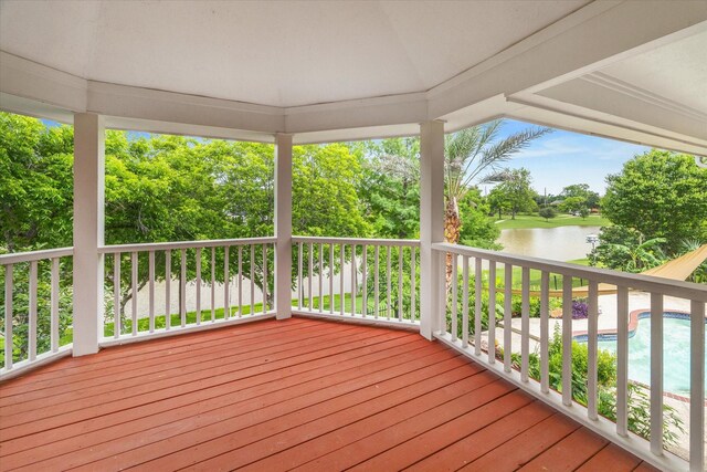 14 Tredington St, Sugar Land, TX 77479 - wooden deck featuring a water view and view of wooded area
