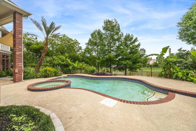 14 Tredington St, Sugar Land, TX 77479 - view of swimming pool with a patio area, a fenced backyard, and a pool with connected hot tub