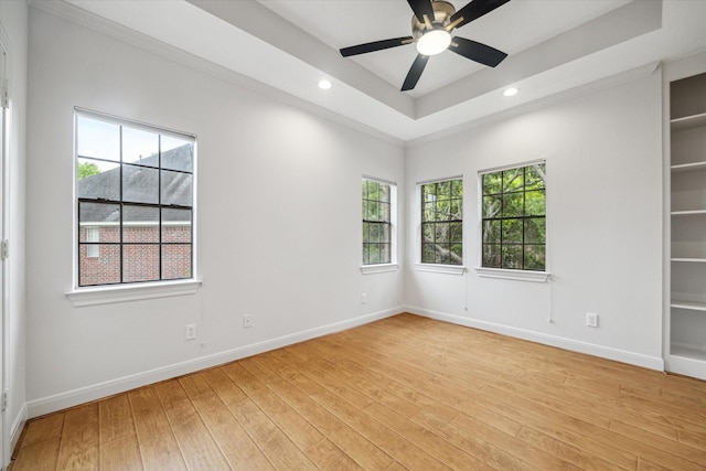 14 Tredington St, Sugar Land, TX 77479 - unfurnished room featuring light wood-style flooring, a tray ceiling, baseboards, recessed lighting, and a ceiling fan