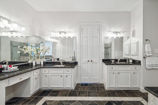 14 Tredington St, Sugar Land, TX 77479 - bathroom with a stall shower and two vanities