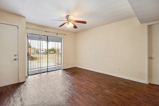 904 University Oaks Blvd Unit 92, College Station, TX 77840 - spare room featuring baseboards, wood finished floors, and ceiling fan