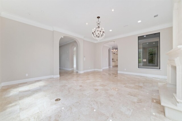 unfurnished living room featuring a chandelier, arched walkways, baseboards, ornamental molding, and recessed lighting