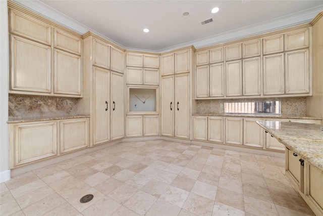 kitchen with light stone counters, crown molding, visible vents, light brown cabinetry, and recessed lighting