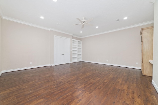 unfurnished room with a ceiling fan, built in shelves, dark wood finished floors, baseboards, and recessed lighting