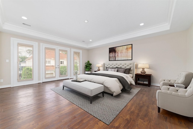 bedroom featuring visible vents, access to outside, crown molding, and a tray ceiling
