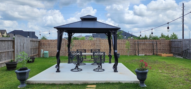 19210 Palfrey Prairie Trl, Tomball, TX 77377 - exterior space featuring a fenced backyard, a patio, and a gazebo