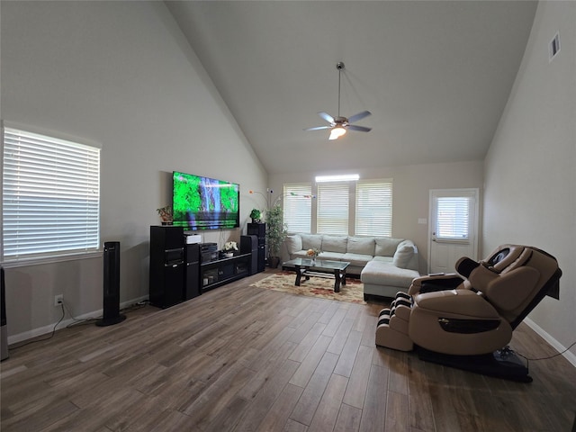 19210 Palfrey Prairie Trl, Tomball, TX 77377 - living area with high vaulted ceiling, a ceiling fan, baseboards, visible vents, and dark wood-style floors