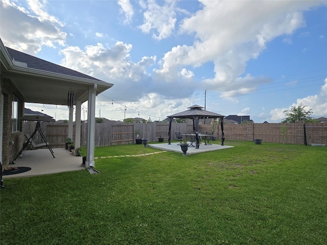 19210 Palfrey Prairie Trl, Tomball, TX 77377 - view of yard with a fenced backyard, a patio, and a gazebo