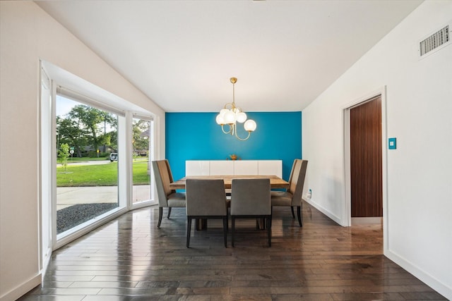 10134 Eddystone Dr, Houston, TX 77043 - dining space featuring dark wood-style floors, baseboards, a chandelier, and visible vents