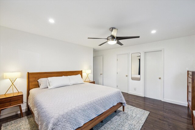10134 Eddystone Dr, Houston, TX 77043 - bedroom featuring ceiling fan, baseboards, dark wood-style floors, and recessed lighting