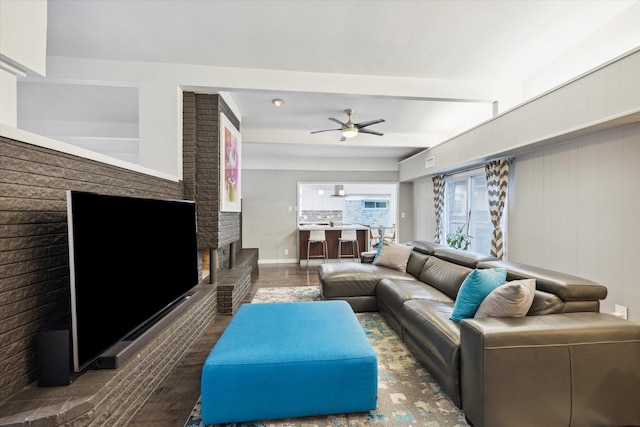 10134 Eddystone Dr, Houston, TX 77043 - living room featuring a ceiling fan and a brick fireplace