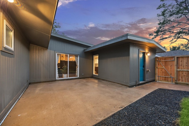 10134 Eddystone Dr, Houston, TX 77043 - exterior space featuring a gate and a patio