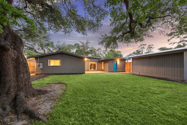 10134 Eddystone Dr, Houston, TX 77043 - back of house featuring fence and a yard