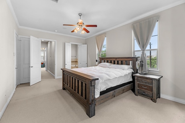 620 Rutland St Unit A, Houston, TX 77007 - bedroom featuring baseboards, light carpet, crown molding, ensuite bathroom, and ceiling fan