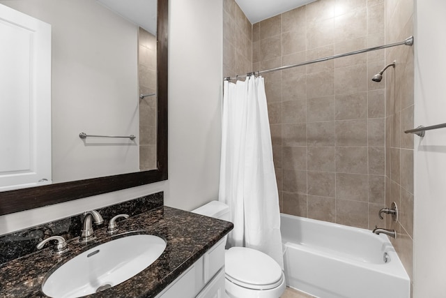 full bathroom with shower / bath combo, toilet, and vanity