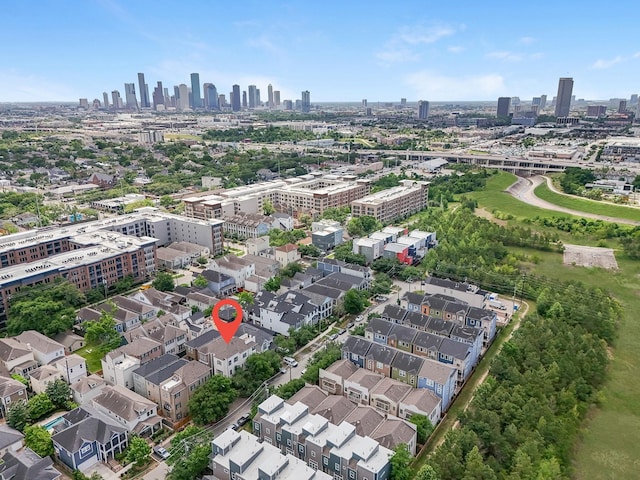 birds eye view of property with a city view